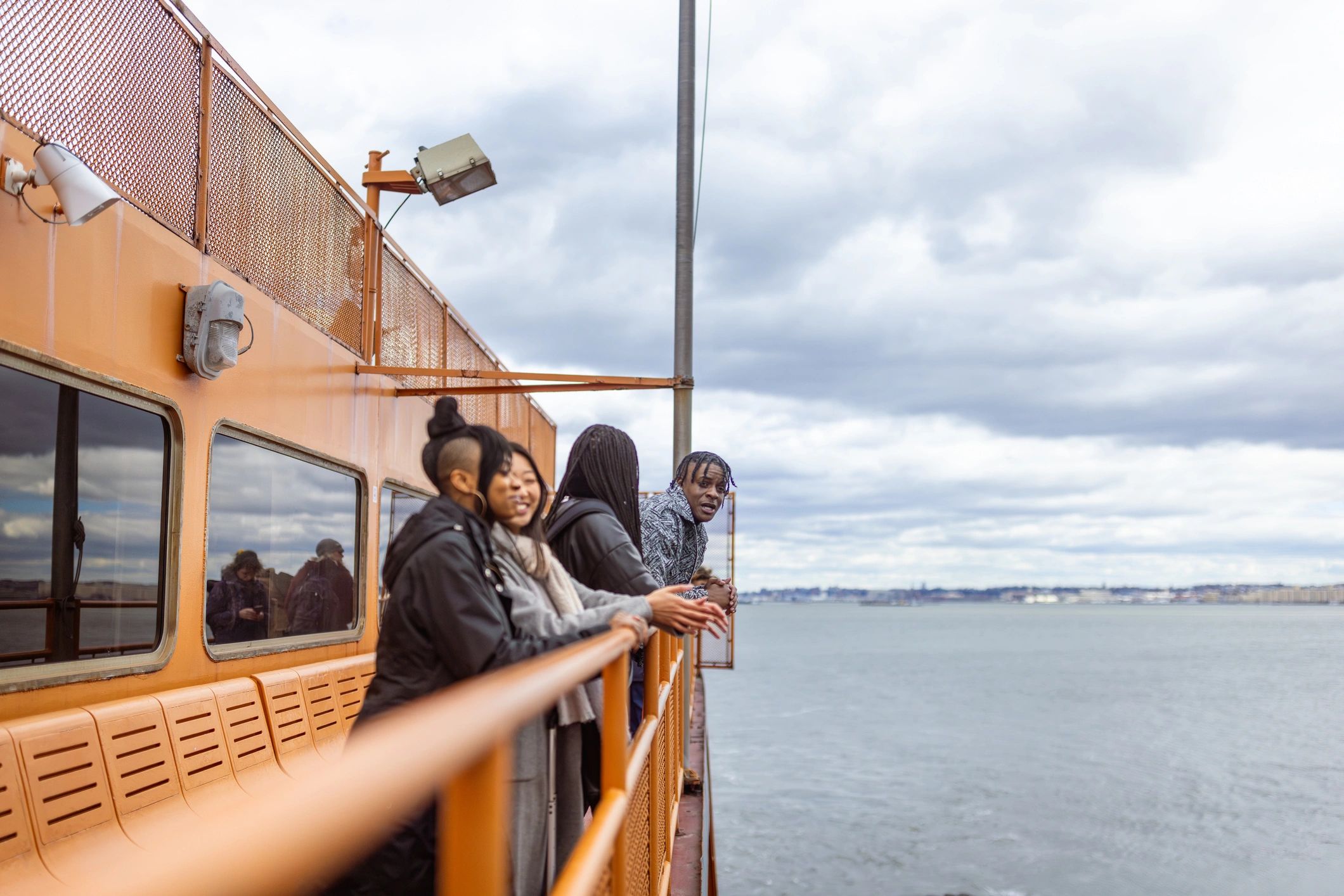 Travellers enjoying time on a cruise deck