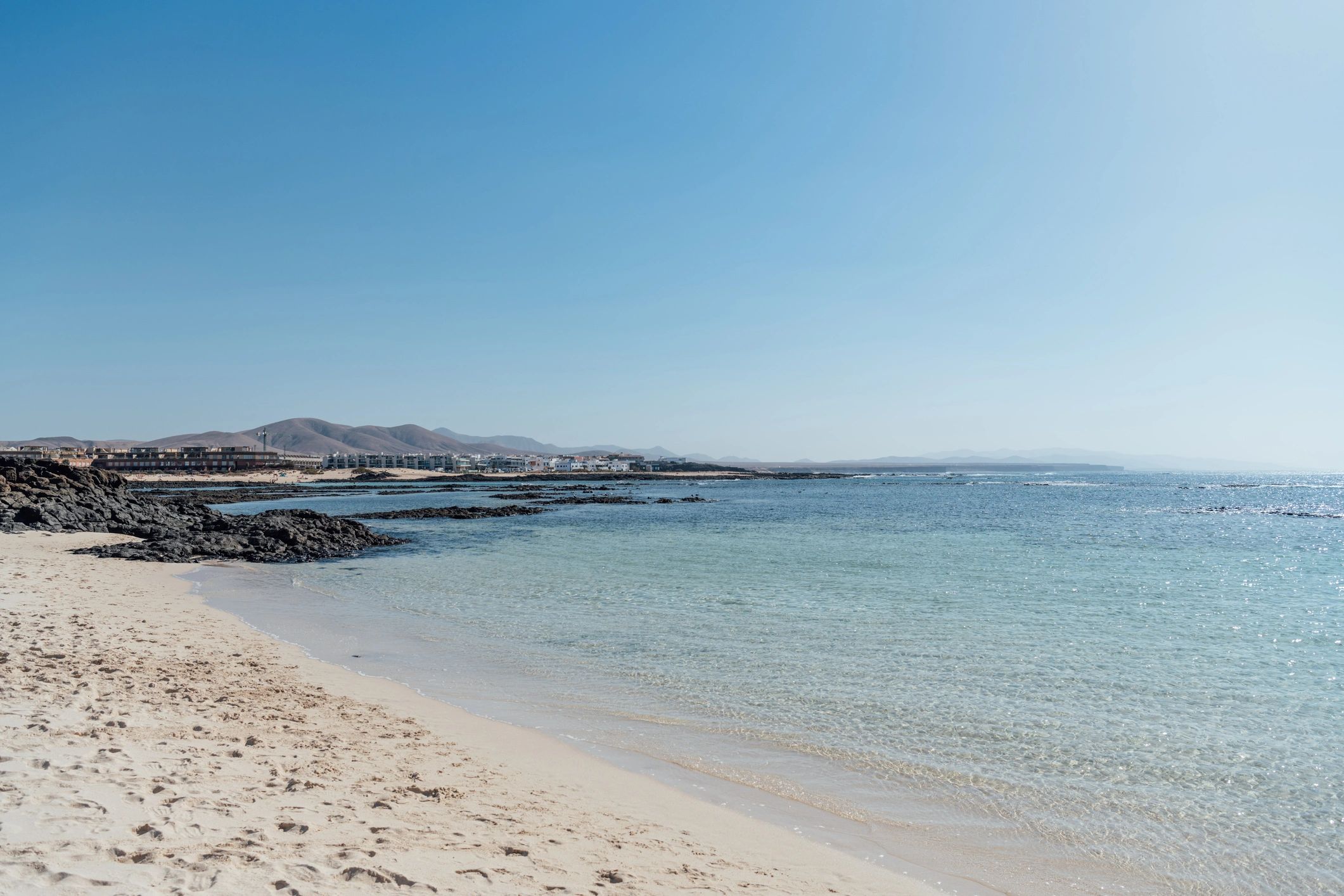 Turquoise beach scene for Canary Islands holidays