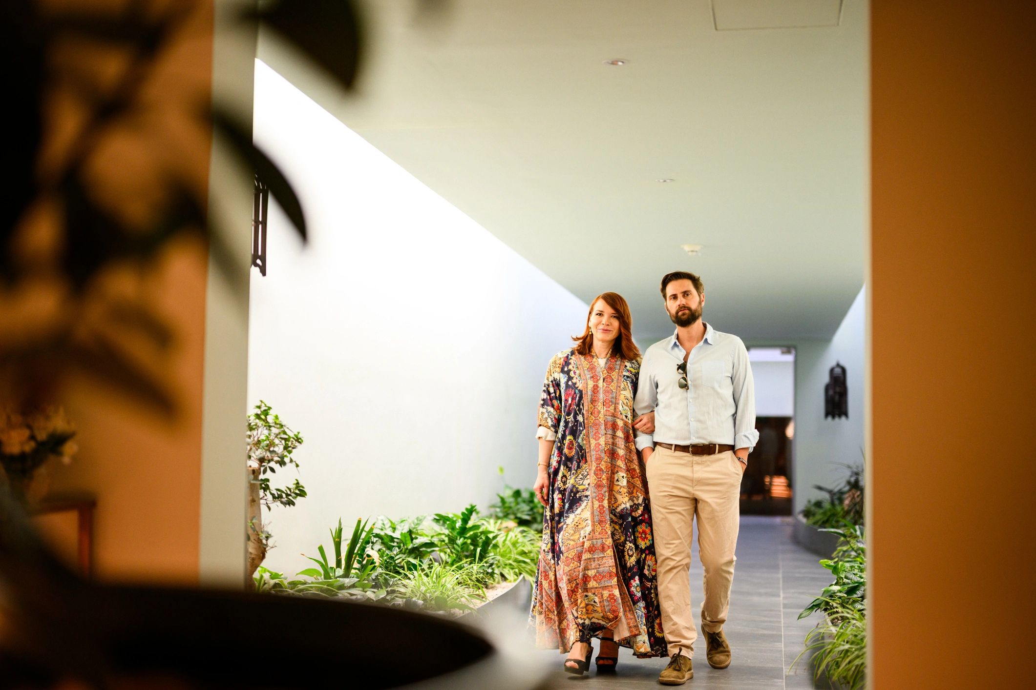 Travellers arriving at a stylish modern resort for an adults only holiday