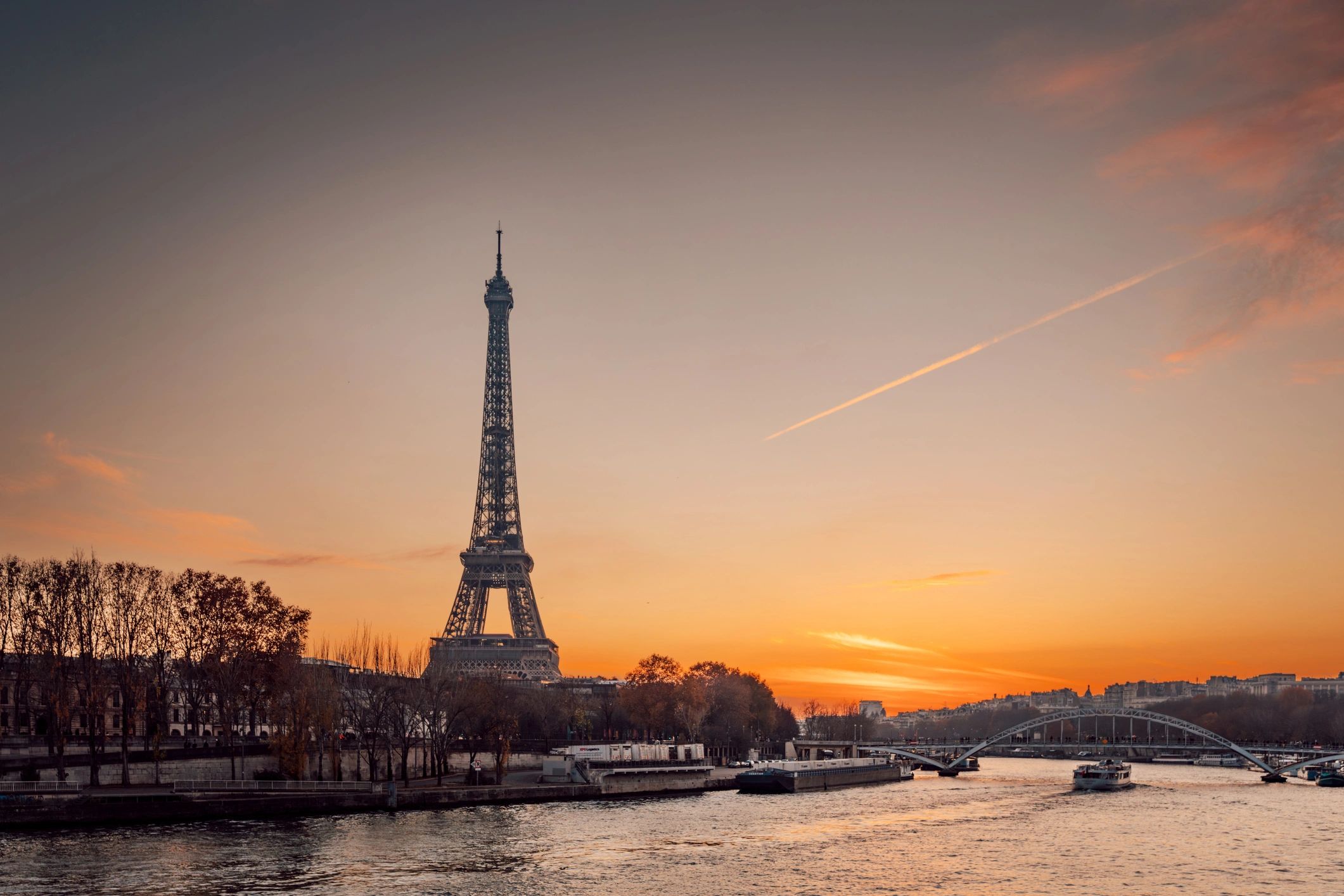 Eiffel Tower at sunset over the Seine in Paris