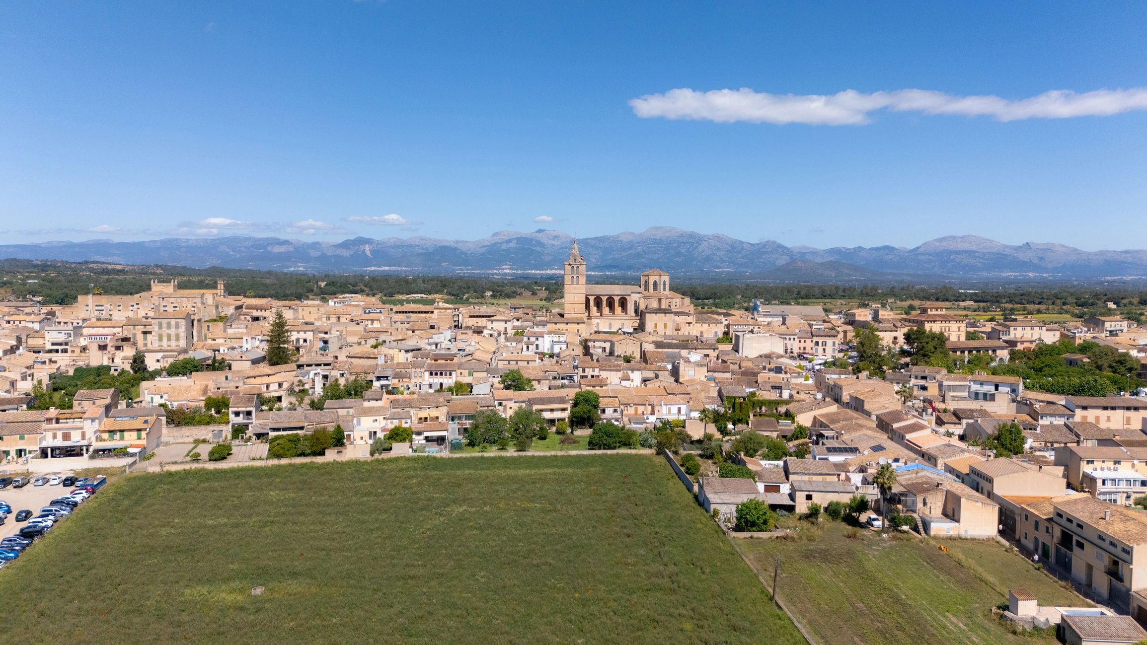 Historic village view in inland Majorca with church and traditional buildings