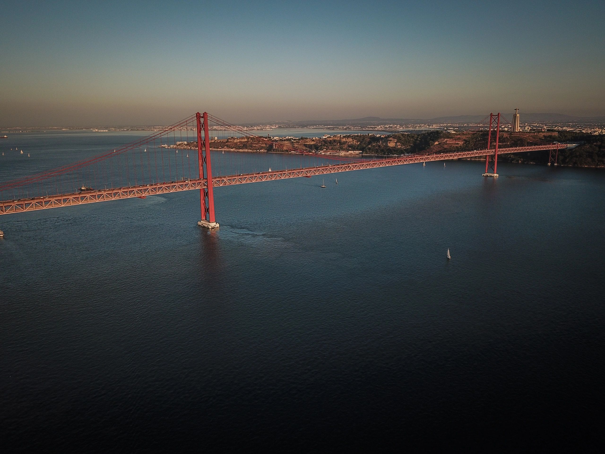 Sunset view of the 25 de Abril Bridge in Lisbon